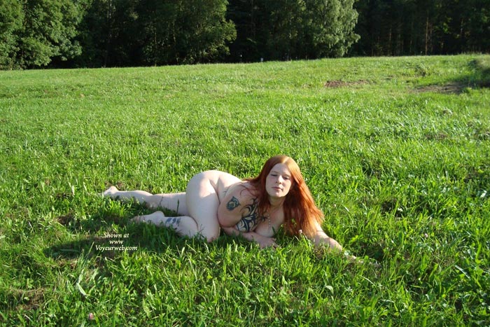 Pic #1 Sexy Redhead Posing Outdoor 2