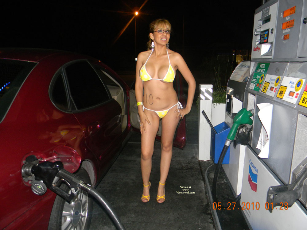 Pic #1 Nude Wife:&nbsp;Nina Pumping Gas In A Bikini