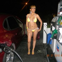 Nude Wife:&nbsp;Nina Pumping Gas In A Bikini