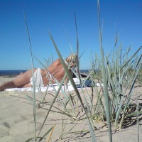 Belorussian Tourist On The Latvian Beach