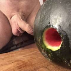 Playing with water melon