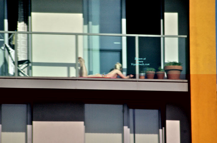 Pic #1 Topless London Balcony Babe