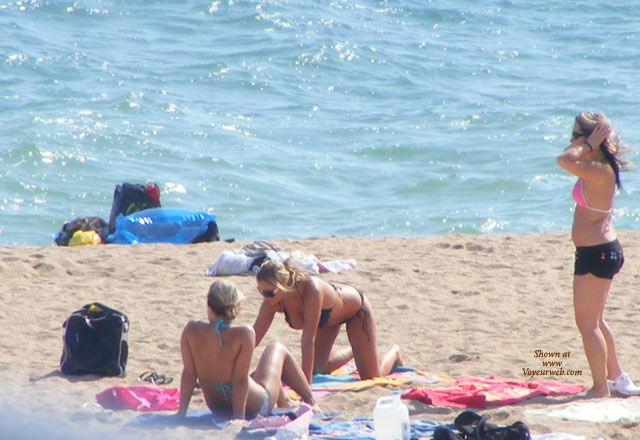 Pic #1 Topless On The Beach