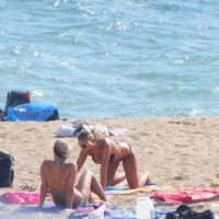 Topless On The Beach